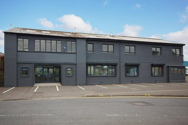 Exterior facade of the dark grey office building at 14-18 East Shaw Street, Kilmarnock.