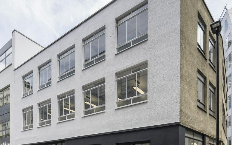 Exterior view of the white brick facade at 14, Charterhouse Bldgs, London.
