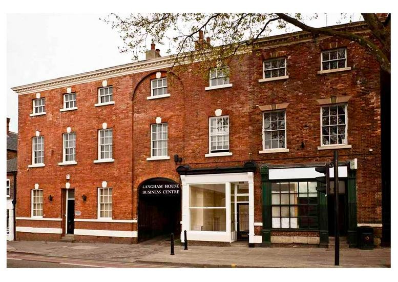 Exterior view of the historic red brick facade of Langham House Business Centre.