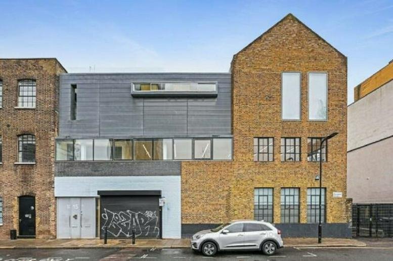 Exterior view of the brick and grey metal facade at 15, Micawber Street, London.