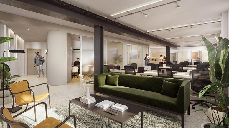 Spacious reception lounge at 161 Farringdon Road, London with a green velvet sofa and yellow armchairs.