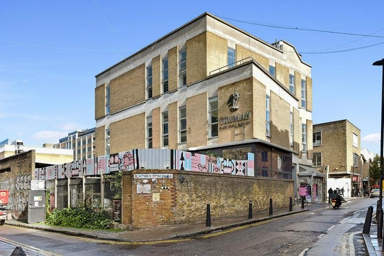 Exterior view of the brick facade and street entrance of 17 Hanbury Street.