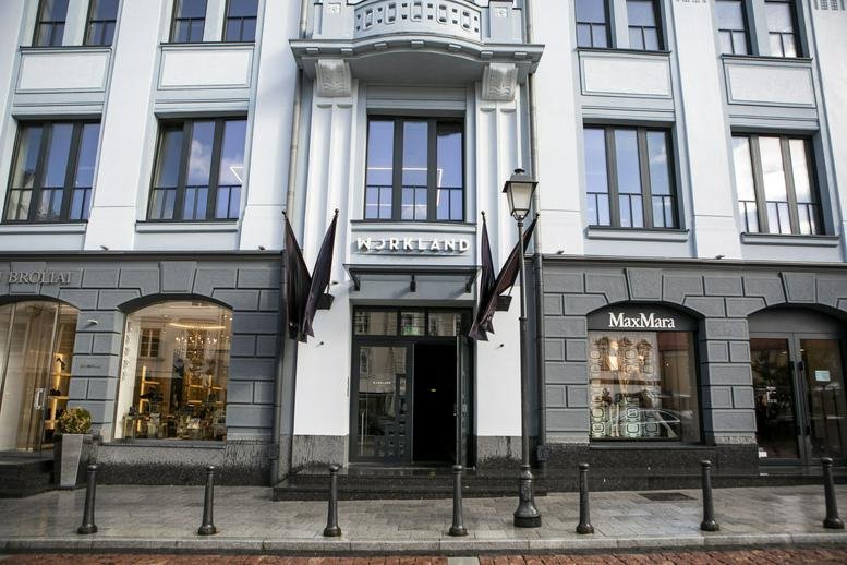 Exterior view of the historic building facade at 18 Didžioji Street, Vilnius.