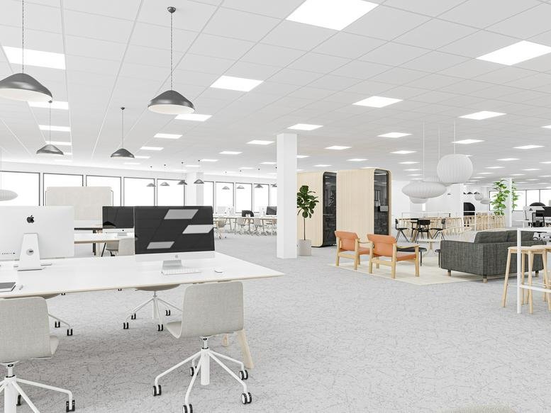 Bright, spacious open-plan common area at 19-20 Canal Walk, Canal Walk District with varied seating and workspace.