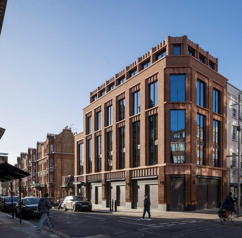 The brick facade and modern architecture of 197 Kensington High Street, 1st Floor, London.