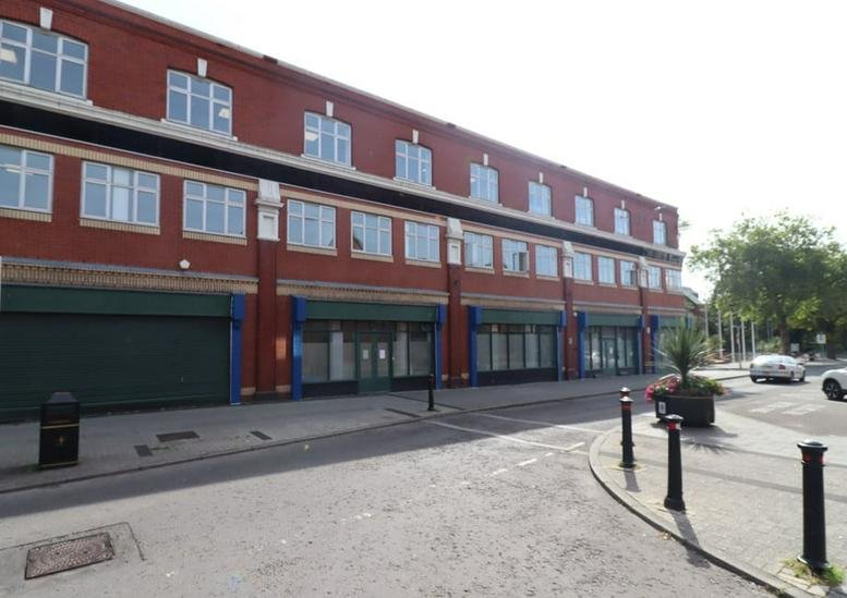 Exterior view of the brick facade at 10 Holton Road, Town Centre, Barry.