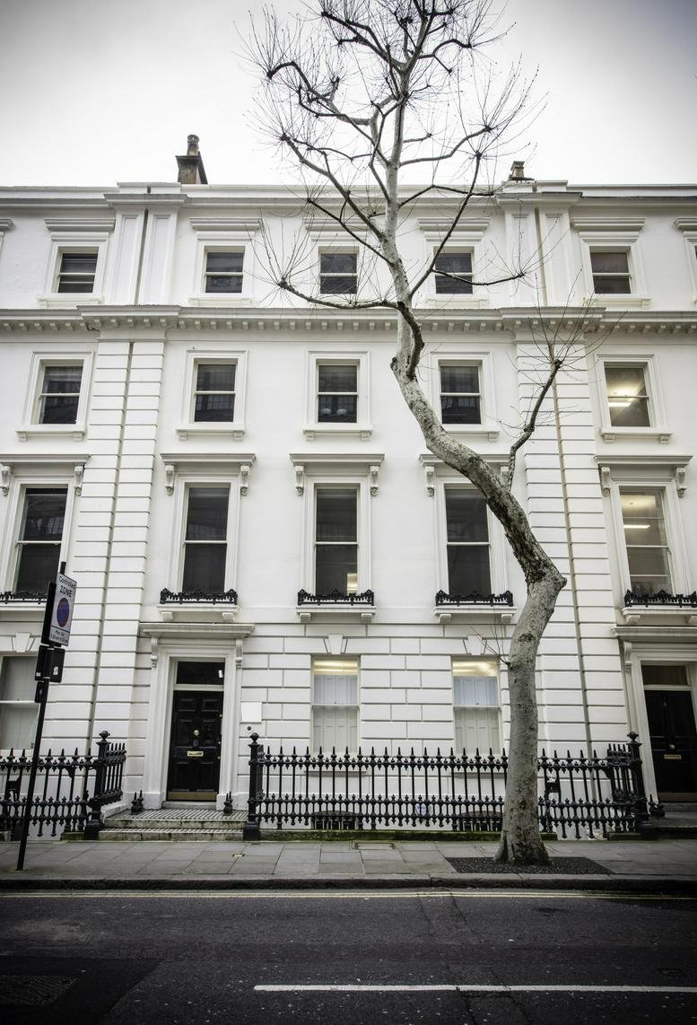 Exterior view of the white Georgian facade at 2 Bloomsbury Place, London.