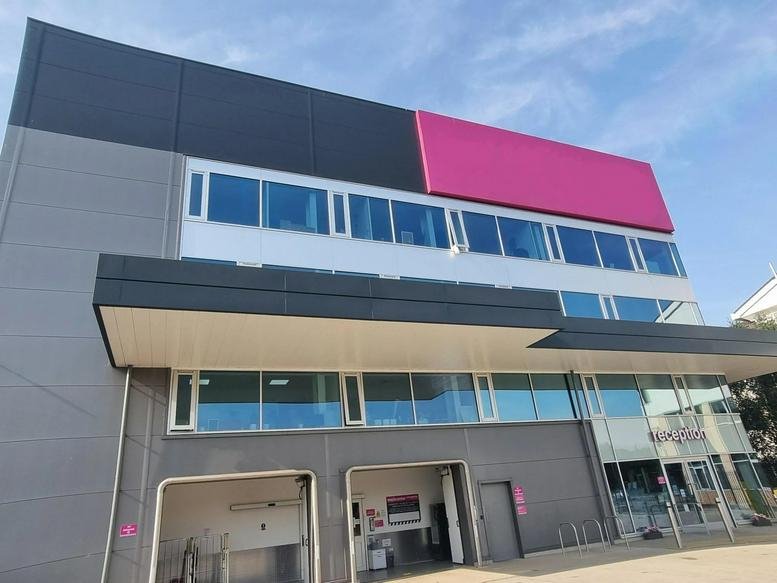 Daytime exterior shot of the contemporary office building at 2 Brookhill Way.