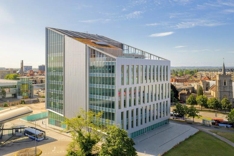 Exterior view of the contemporary glass and steel building at 2 Brunel Place, Slough Town Centre.