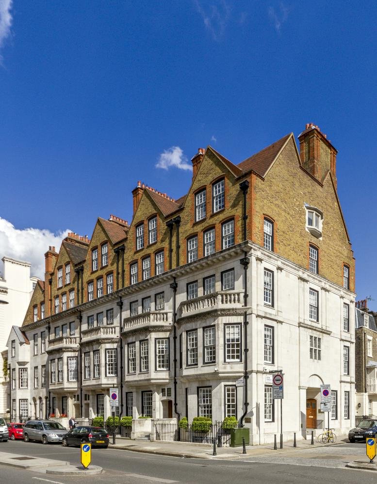 Exterior view of the historic brick and white stone building at 2 Eaton Gate, Central London, SW1W.