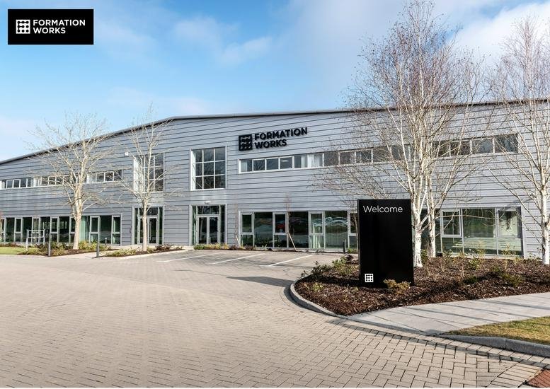 Exterior view of the modern metal-clad building at 2 Edenaveys Industrial Estate.