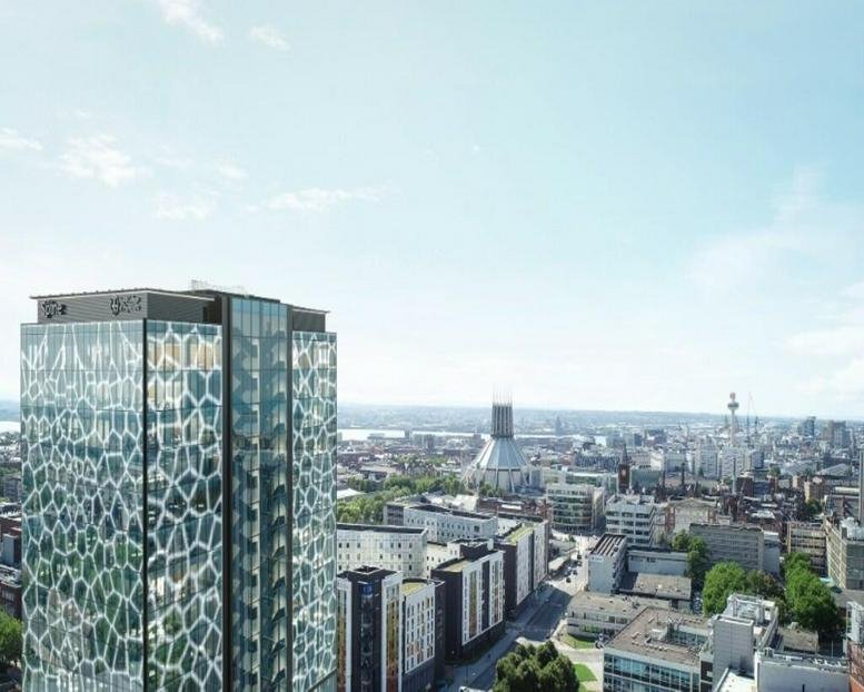 Exterior view of the glass-facade 2 Paddington Village skyscraper with city views.