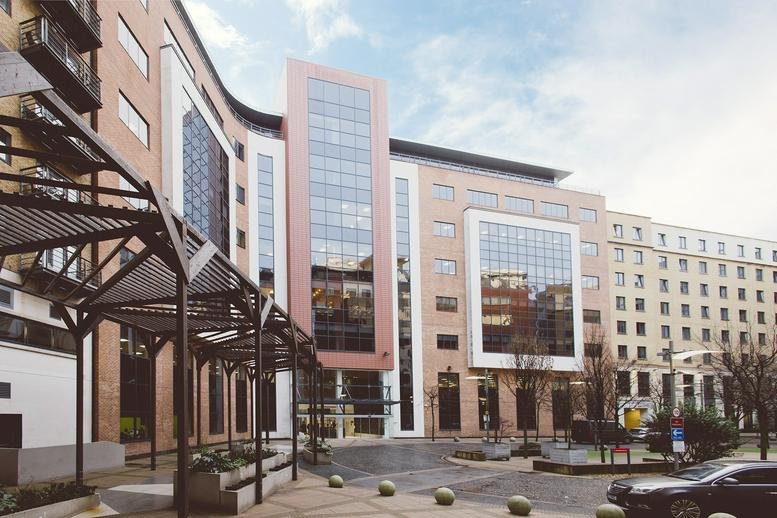Exterior view of the multi-story brick and glass facade of 2 St James’ Gate, Newcastle.