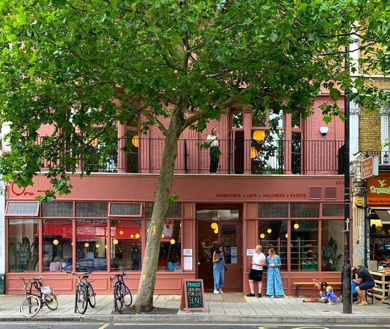 Exterior view of the red-brick facade at 20-22 Lordship Lane, Central London, SE22, UK.