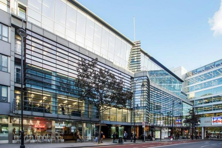 Exterior view of the modern glass and steel facade of 20 Midtown, 20 Procter Street, London.