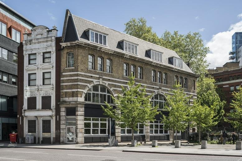 Traditional brick and stone exterior facade of 215 Borough High Street.
