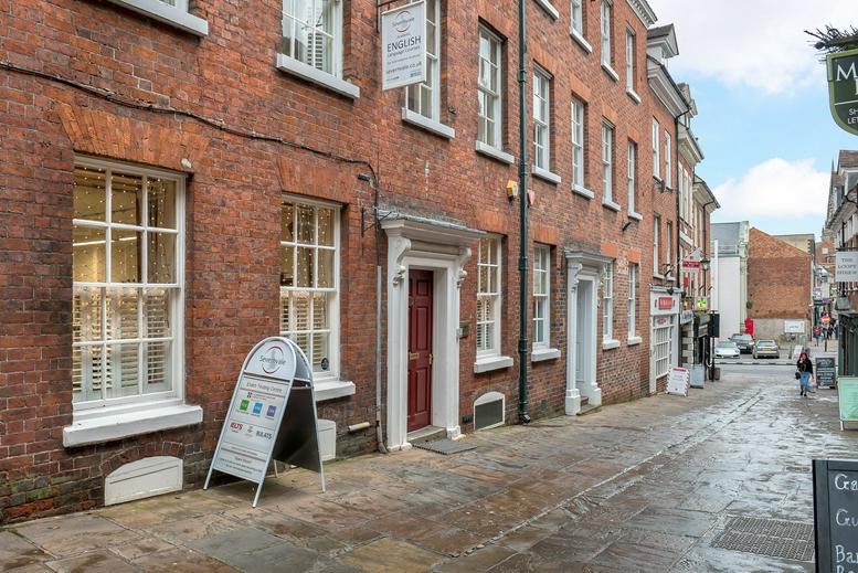 Exterior street view of the red brick building at 25 Claremont Hill, Shrewsbury, Shropshire.