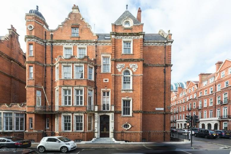 Exterior view of the red brick period building at 25 Green Street, Mayfair.