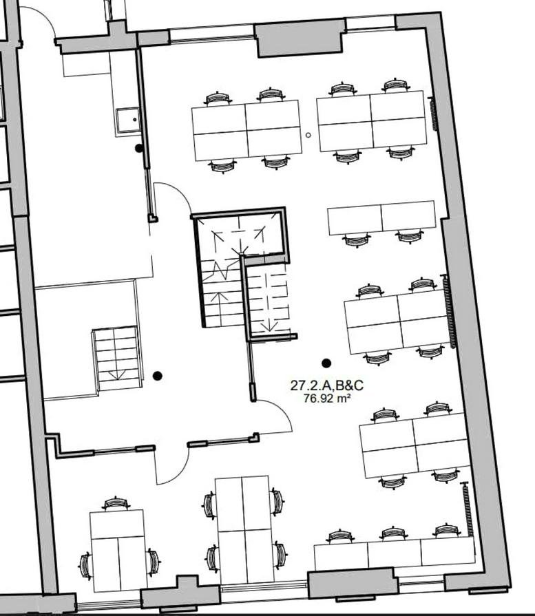 Exterior view of the brick facade and yellow entrance at 25 Horsell Road, Islington.