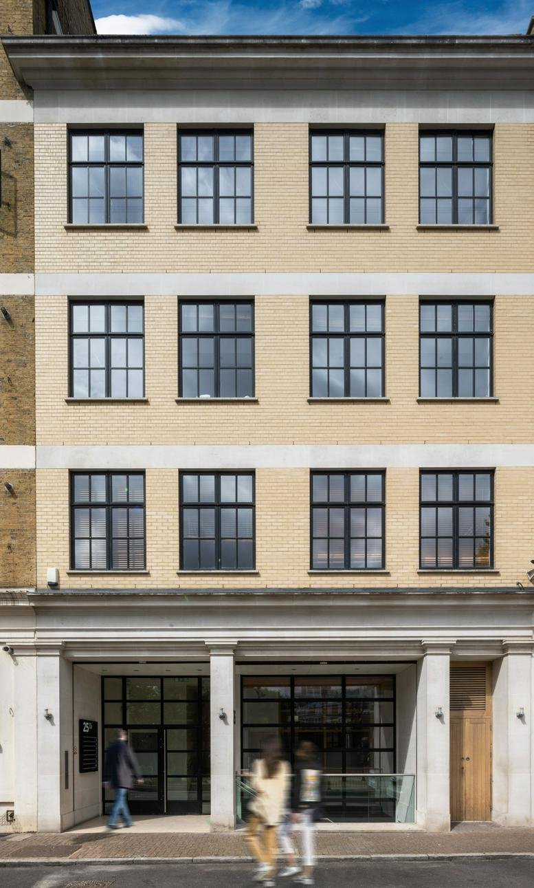 Exterior view of the brick-facade building at 25, West Tenter Street, London.