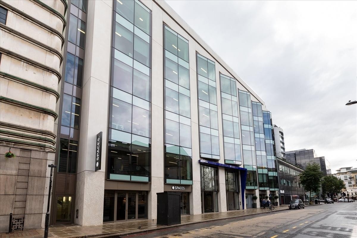 Exterior view of the modern glass-facade building at 25 Wilton Road, Pimlico.