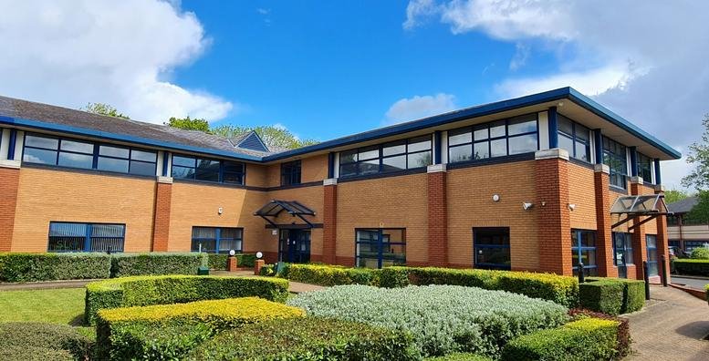 Exterior view of the brick facade at 3 Links Court, Saint Mellons Business Park.