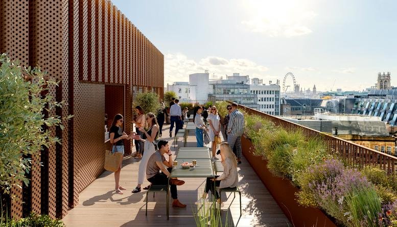 Rooftop terrace at 3 New Street Square with seating, planters, and views of the London skyline.