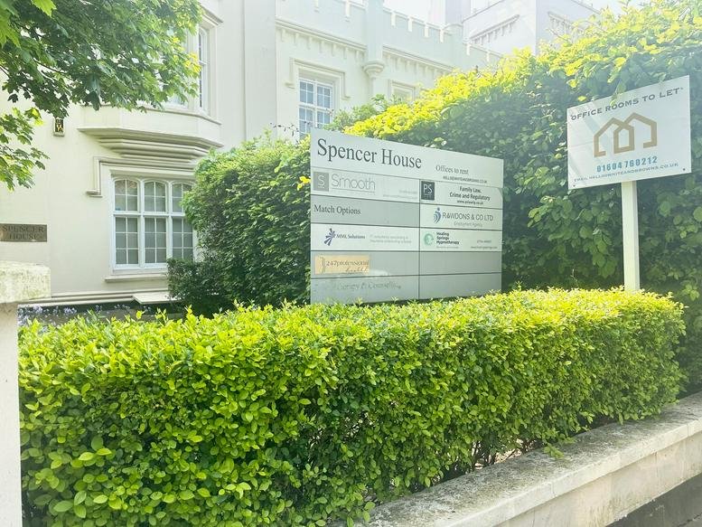 Exterior view of the white facade and landscaped entrance at Spencer Parade, Spencer House.
