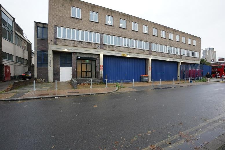 Exterior view of the brick industrial building at 30 Engate Street, London.