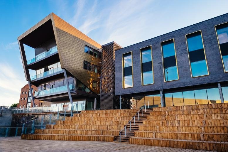 Exterior view of the modern geometric building at 31-38 Queen Street.