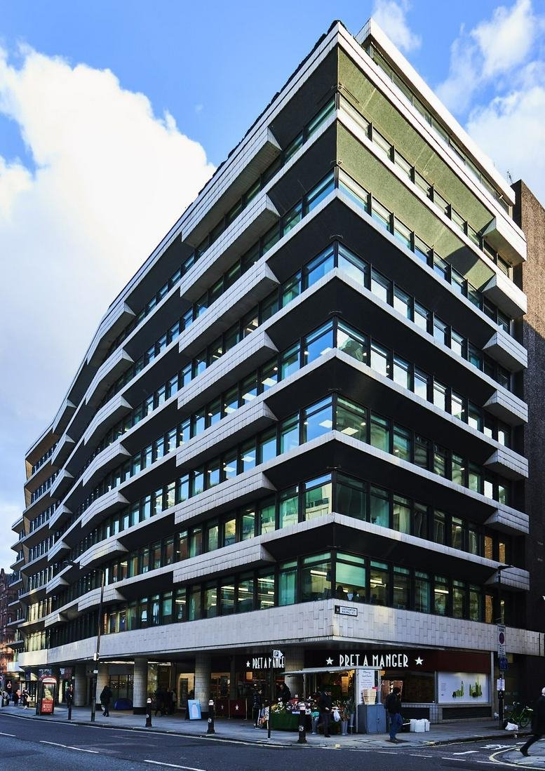 Exterior view of the modern glass and stone building at 322 High Holborn, WC1V.