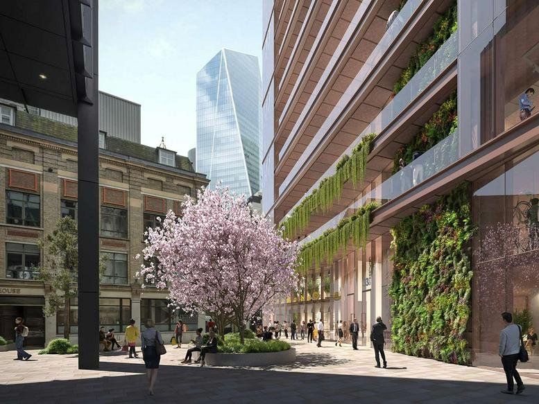 Exterior courtyard at 33, Creechurch Lane featuring a blooming cherry blossom tree and modern facade.