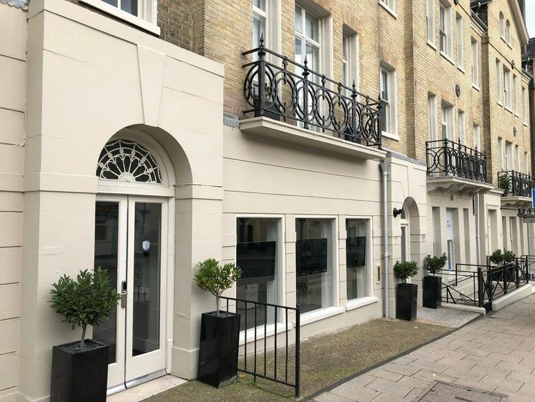 Exterior entrance of the traditional stone building at 34-40 Prince of Wales Road.