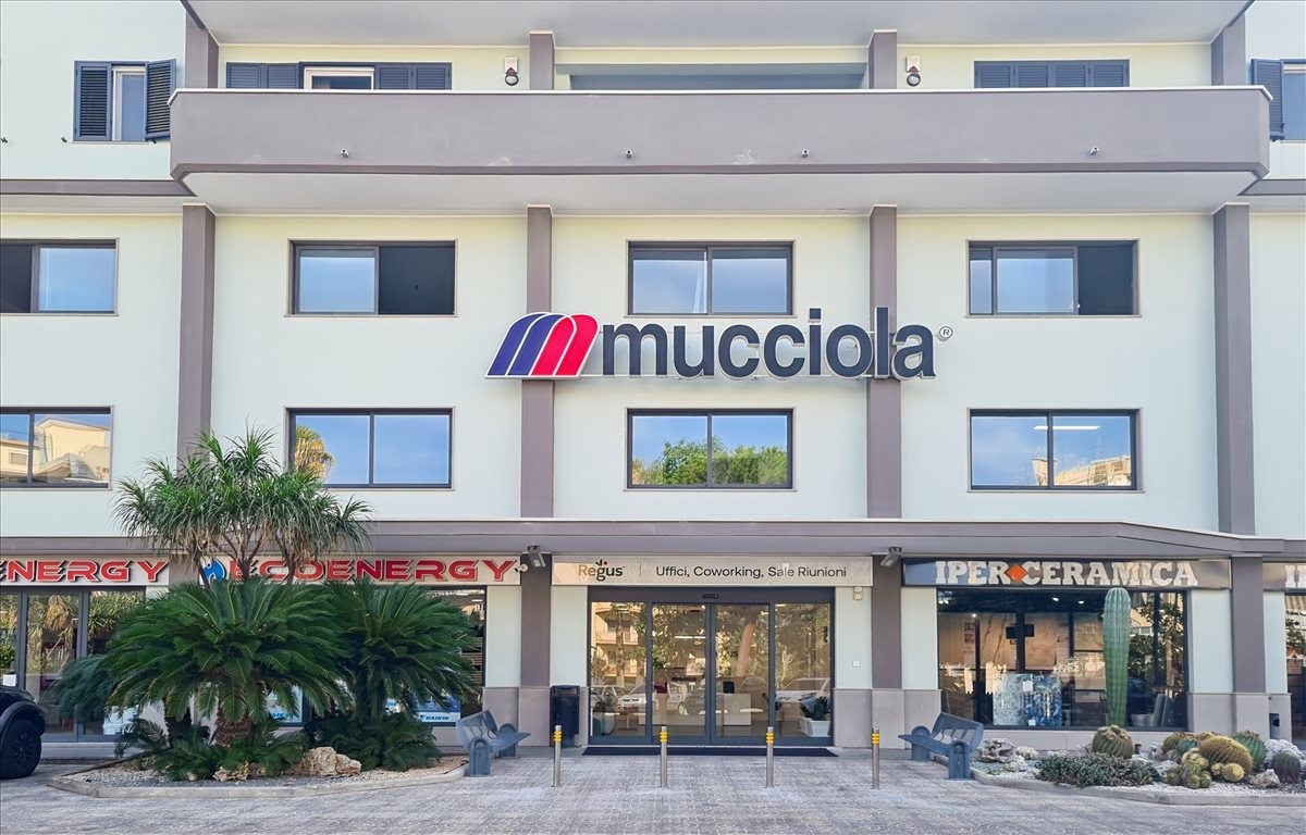 Exterior view of the multi-story building at 351 Viale Calabria.