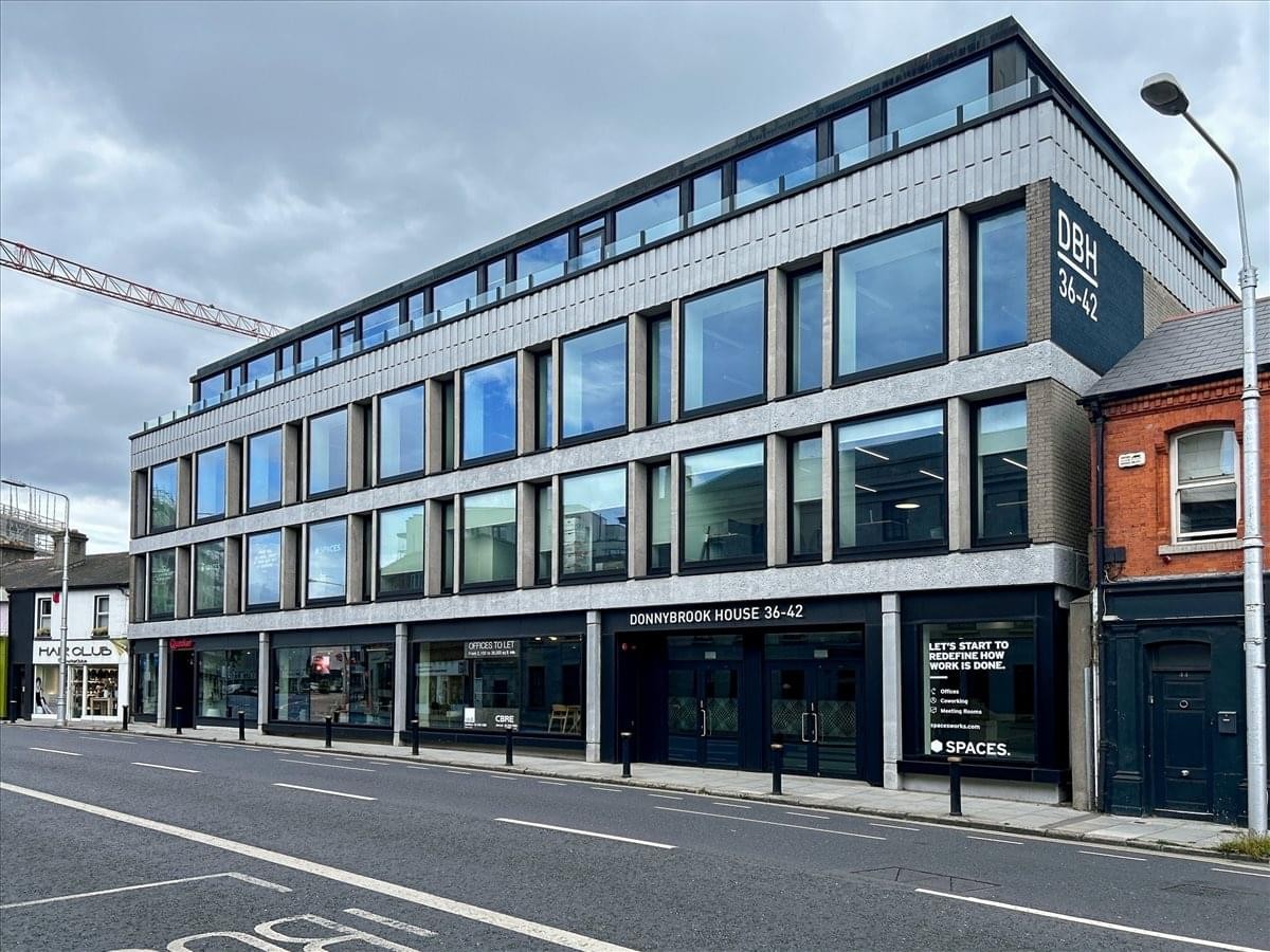 Modern exterior facade of Donnybrook House on a clear day.
