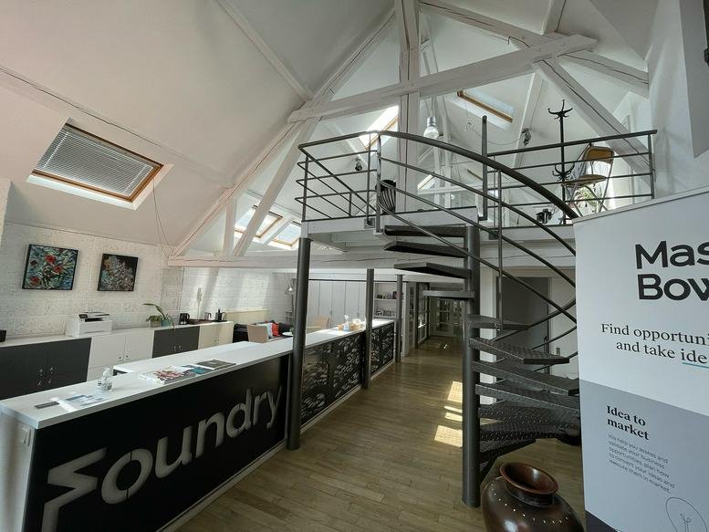 Interior view of the modern vaulted workspace at 38, Route d’Esch, Hollerich, Luxembourg City.