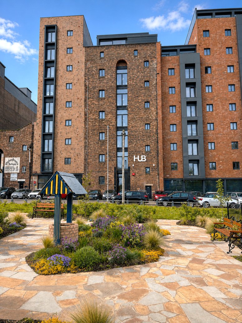 Exterior view of the brick facade at 3A Bridgewater Street with a landscaped courtyard.