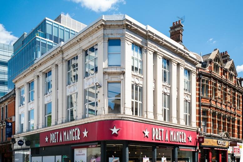 The classic white stone exterior of 4, Lyric Square, London featuring a Pret A Manger on the ground floor.