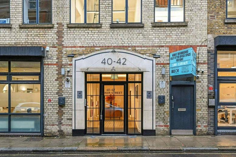 Exterior view of the brick facade and entrance at 40, Parker Street, London.