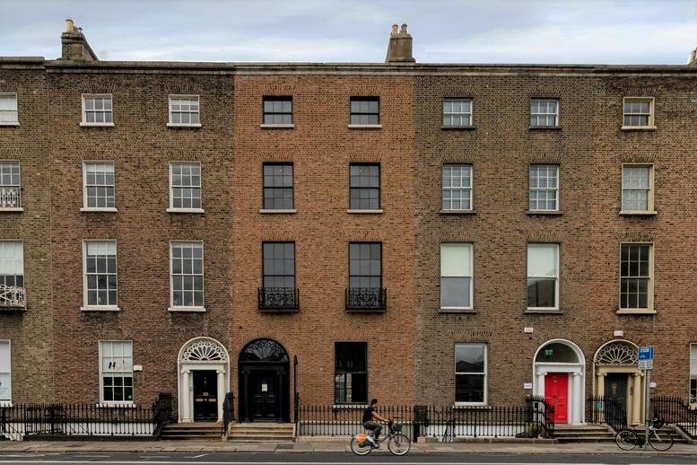Exterior street-level view of the historic brick building at 41 Leeson Street Lower.