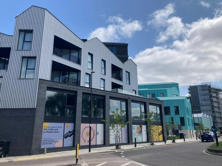 Exterior view of the modern mixed-use building at 415 Wick Lane.