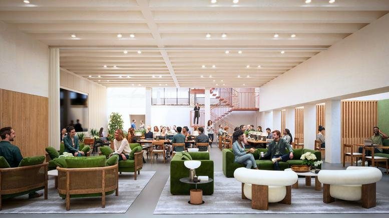 Wide-angle view of the spacious, light-filled communal lounge and coworking hub at 42 Portland Place, Marylebone.