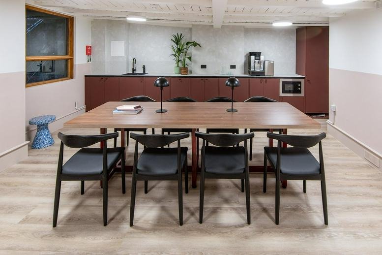 Spacious communal dining area and kitchen at 45 Broadwick Street, London.