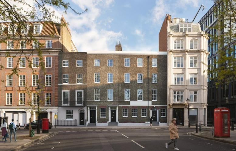Exterior view of the traditional brick and stone facade of 46 Bedford Row, Central London, WC1R.