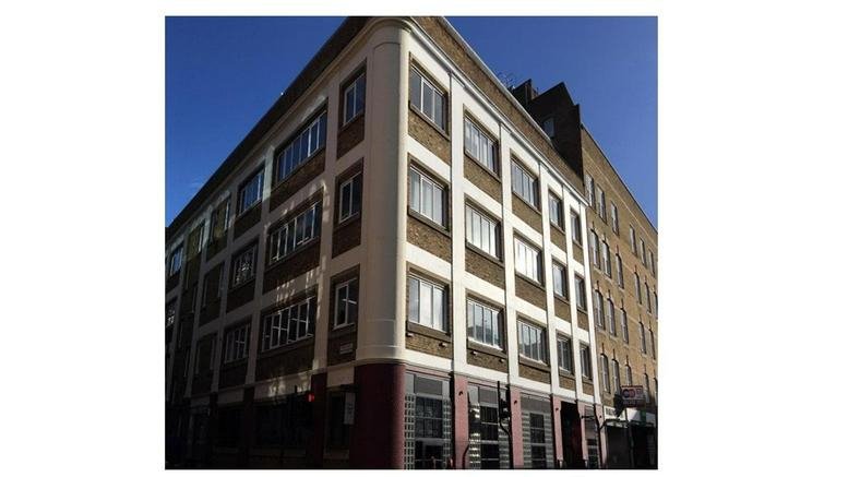 Exterior view of the brick and white-trimmed building at 47-51 Great Suffolk Street.