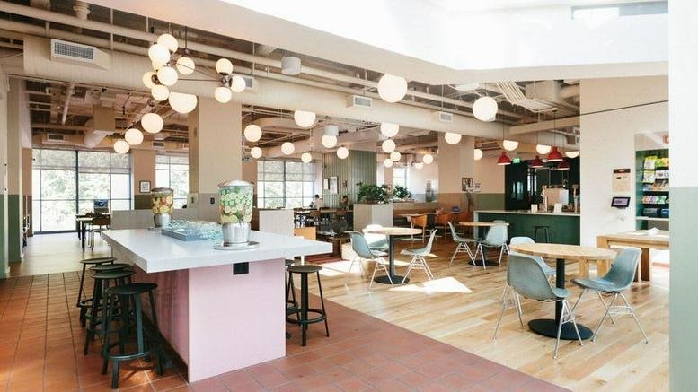 The expansive, sunlit communal lounge and break area at 5 Harcourt Road, Dublin.