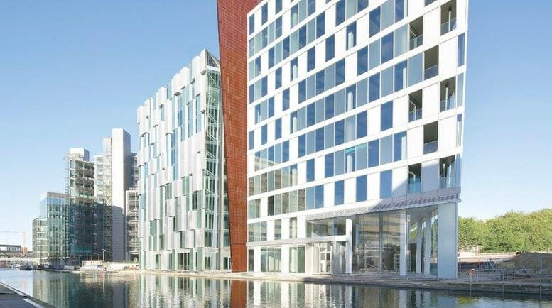 Exterior facade of the modern waterfront building at 5 Merchant Square, Westminster.