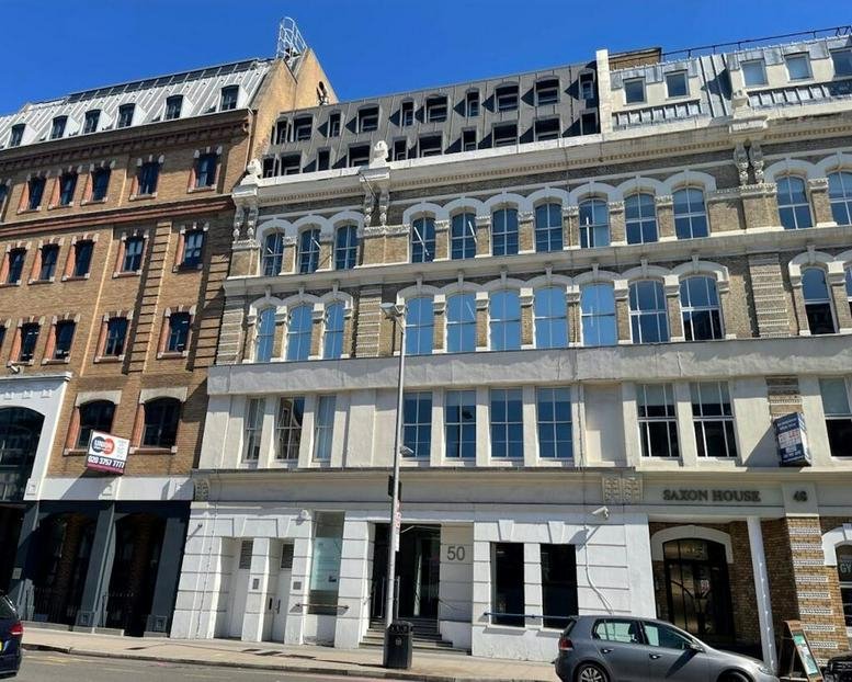 Exterior view of the historic brick facade at 50 Southwark Street, London.