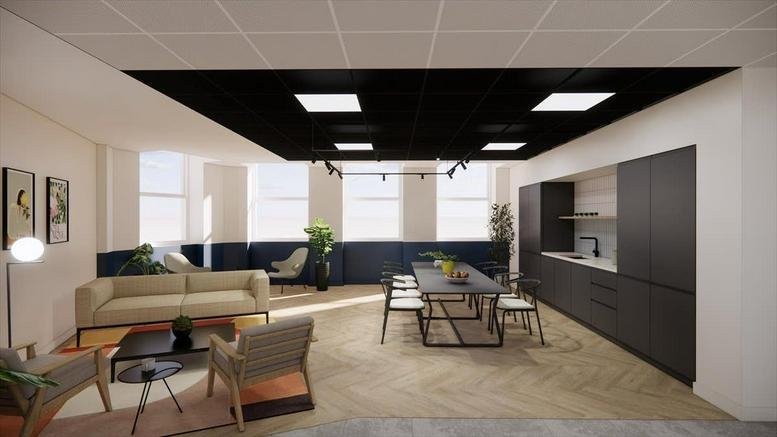 Social hub with a dining area, kitchen, and comfortable sofa seating.