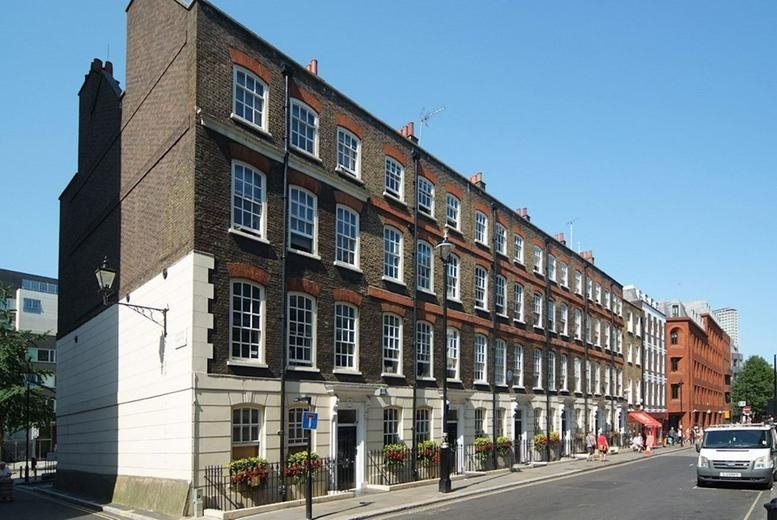 Street view of the historic brick terrace building at 56-58 Broadwick Street.